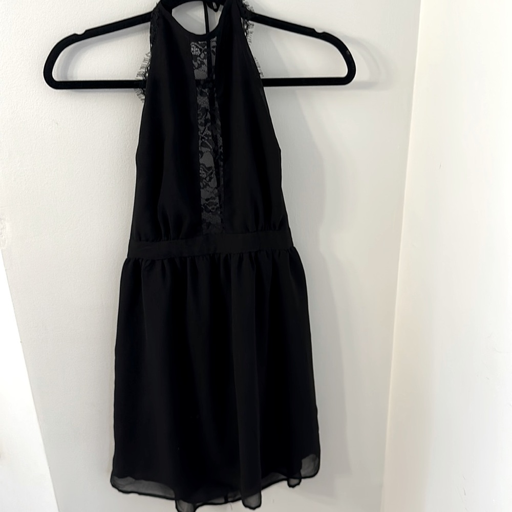 Backless halter black dress with lace accents